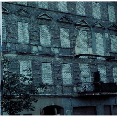 Bricked up windows at Bernauer Str.; the facade was part of the wall.